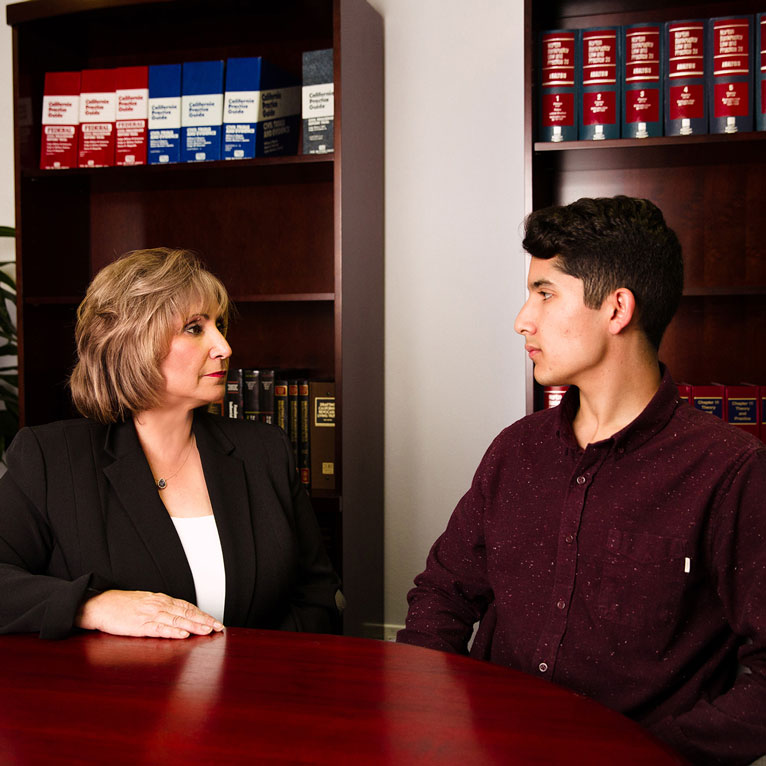 Attorney Diane Mancinelli with young man